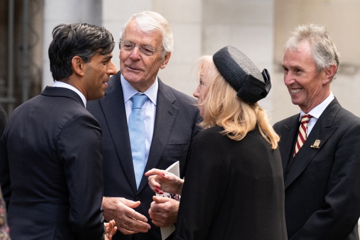 Prime Minister Rishi Sunak (far left), former prime minister sir John Major (second left), and Deputy Speaker of the House of Commons, Dame Eleanor Laing and Nigel Evans (right) leave St Margaret's Church in central London after attending a Service of Thanksgiving for the life and work of former Chancellor of the Exchequer, Lord Lawson who died earlier this year. (Stefan Rousseau/PA Wire)