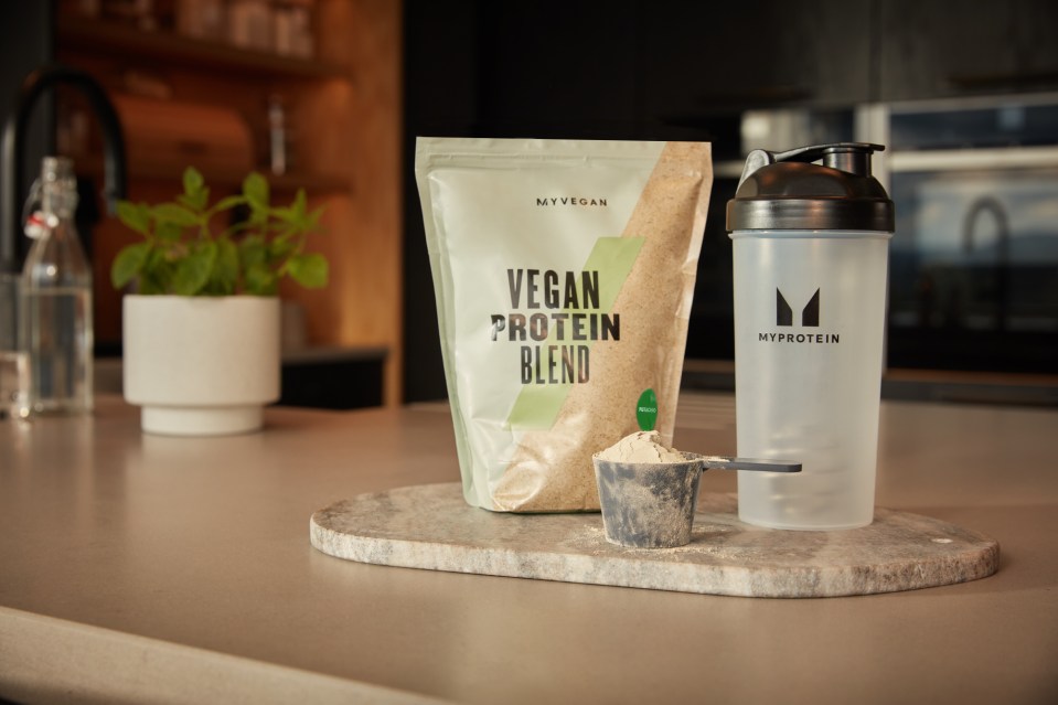 A picture of Myprotein’s Vegan Protein Blend and branded water bottle.