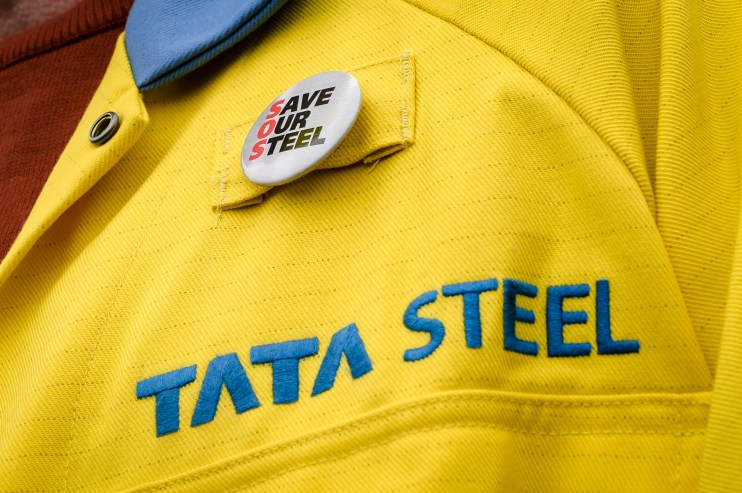A steel worker wearing a badge on his jacket outside the UK's largest steel works in Port Talbot, South Wales. Unions representing steelworkers will meet industry giant Tata on Thursday for talks about the future of the company. There have been fears of heavy job losses, especially at the plant in Port Talbot, South Wales, under moves to move to a greener form of steelmaking to cut emissions and stem financial losses. Issue date: Thursday January 18, 2024. PA Photo. See PA story INDUSTRY Steel. Photo credit should read: Ben Birchall/PA Wire