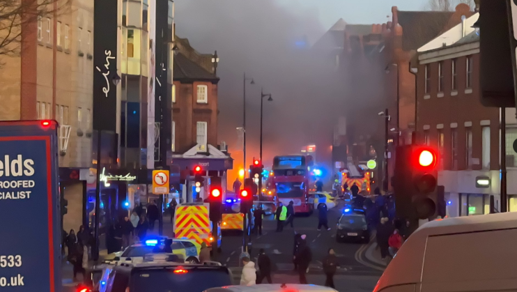 An electric bus caught fire in Wimbledon on Thursday