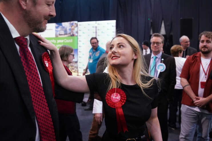 Labour Party candidate Gen Kitchen celebrates with Labour MP for Chesterfield Toby Perkins after being declared winner in the Wellingborough by-election at the Kettering Leisure Village, Northamptonshire. PA Photo. Picture date: Friday February 16, 2024. See PA story POLITICS ByElections. Photo credit should read: Joe Giddens/PA Wire