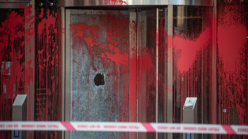 Red paint has been daubed on the offices of BNY Mellon by Palestine Action