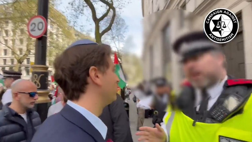 Screengrab from video taken with permission from the social media site X, formerly Twitter, posted by Campaign Against Antisemitism of their chief executive Gideon Falter speaking to a Metropolitan Police during a pro-Palestine march in London. Mr Falter, was wearing a kippah skull cap when he was stopped from crossing the road near the demonstration in the Aldwych area of London on Saturday afternoon. Photo credit : Campaign Against Antisemitism/PA Wire