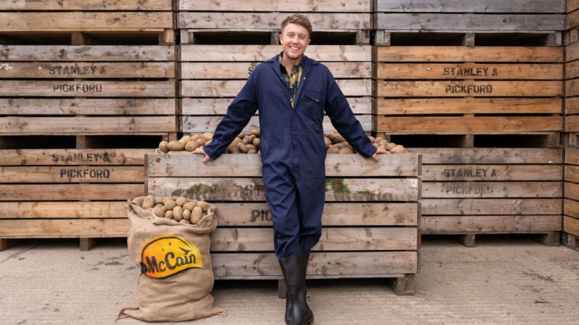Roman Kemp poses at a McCain farm to launch the brand's new "Let's All Chip In" on July 10, 2023 in Oxford, England. (Photo by Jeff Spicer/Getty Images for McCain)