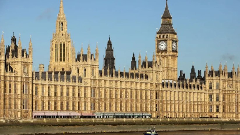 Two men have been charged with spying for China after an investigation by counter-terrorism police.