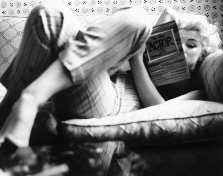 NEW YORK - MARCH 1955: Actress Marilyn Monroe reads the book "To the Actor: On the Technique of Acting" by Michael Chekhov in a quiet moment at the Ambassador Hotel in March 1955 in New York City, New York. (Photo by Ed Feingersh/Michael Ochs Archives/Getty Images)