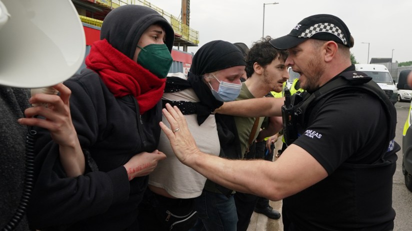 The government should introduce a blanket ban on face coverings at protests, an advisor on political violence has recommended. Photo: PA