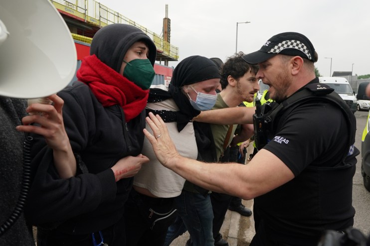 The government should introduce a blanket ban on face coverings at protests, an advisor on political violence has recommended. Photo: PA