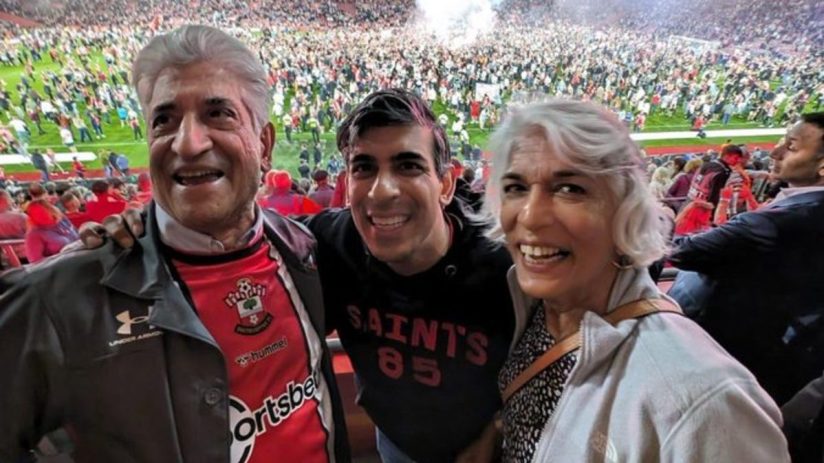 Rishi Sunak with parents at football match