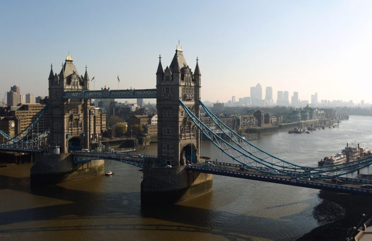 LONDON, ENGLAND - MARCH 07: Tower Bridge with Canary Wharf in the distance viewed from the top of City Hall on March 7, 2011 in London, England. (Photo by Richard Heathcote/Getty Images)