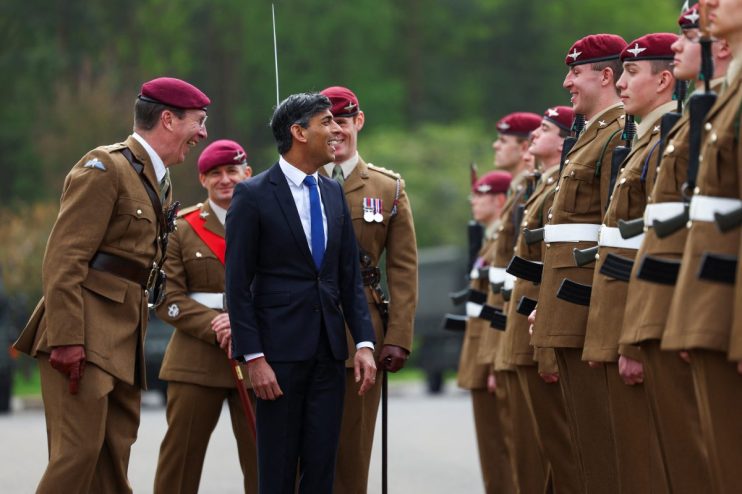 CATTERICK, UNITED KINGDOM - MAY 3: Britain's Prime Minister Rishi Sunak and Lieutenant General Andrew Harrison react on the day of inspecting the Passing Out Parade of the Parachute Regiment recruits during Sunak's visit to the Helles Barracks at the Catterick Garrison, a military base in North Yorkshire, on May 3, 2024 in Cattrick, England. (Photo by Molly Darlington-WPA Pool/Getty Images)