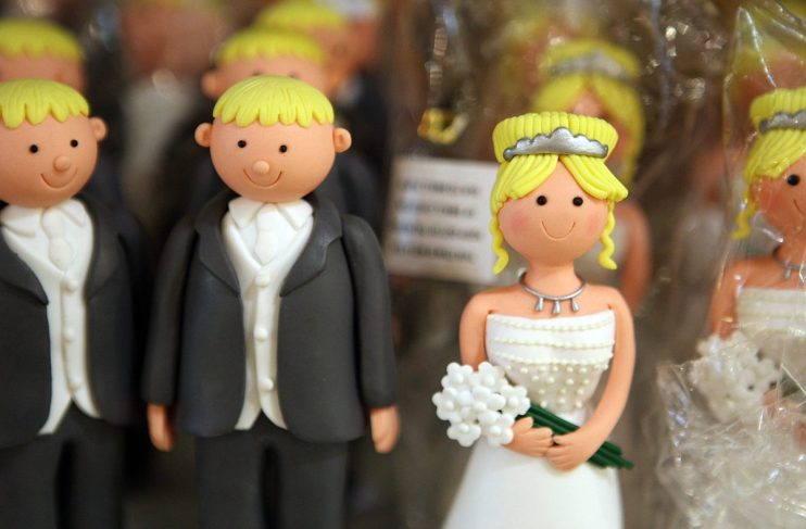 LONDON - JULY 10: Wedding cake bride & groom figures are displayed for sale on July 10, 2007 in London. (Photo by Peter Macdiarmid/Getty Images)