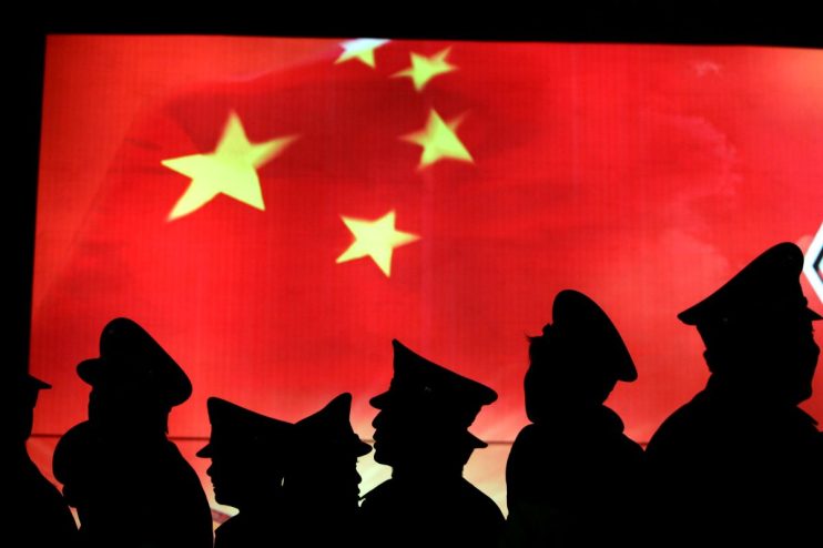 China is entering the year of the snake today, with hopes of a shift in its economy. (Photo by China Photos/Getty Images)
