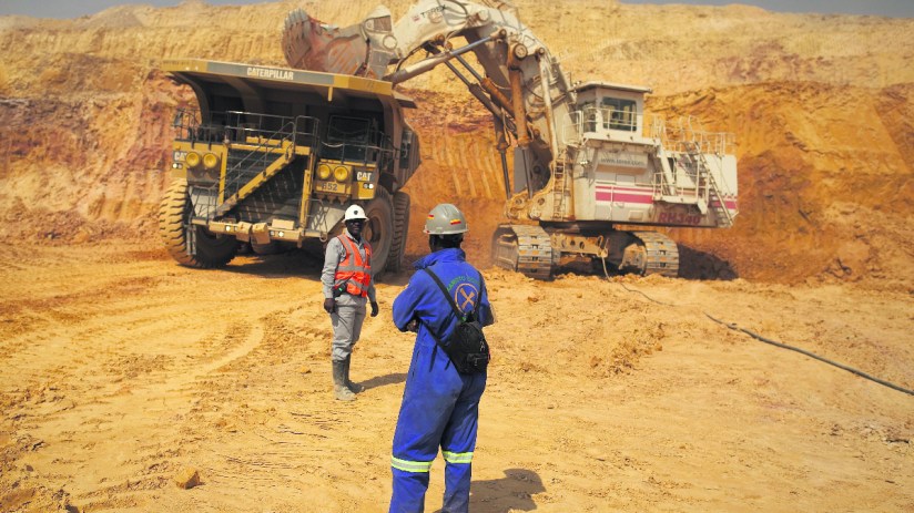 FTSE 100 miner Glencore's adjusted earnings before interest and taxes fell by a third.