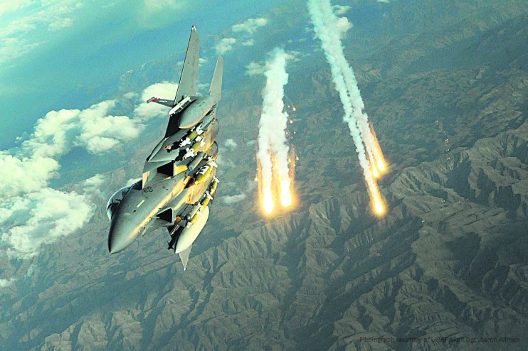 An F-15E Strike Eagle deploys countermeasure flairs over Afghanistan. . (U.S. Air Force photo/Staff Sgt. Aaron Allmon)