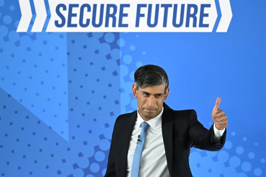 TOWCESTER, ENGLAND  - JUNE 11: Prime minister Rishi Sunak gives a thumbs-up gesture after speaking speaks at the Conservative Party's general election manifesto launch at Silverstone Circuit on June 11, 2024 in Towcester, United Kingdom. Financial security for working people topped the Conservatives' list of pledges, which also includes tax cuts, measures to curb migration and boost the economy.  (Photo by Leon Neal/Getty Images)