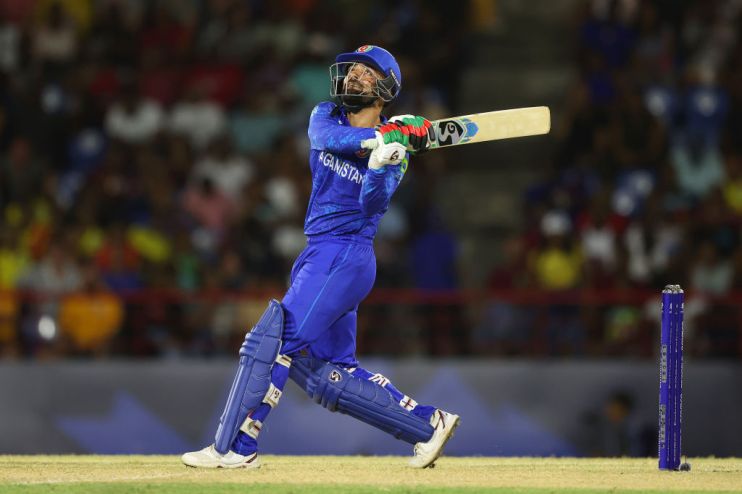 Rashid Khan hit three late sixes as Afghanistan reached the T20 World Cup semi-finals