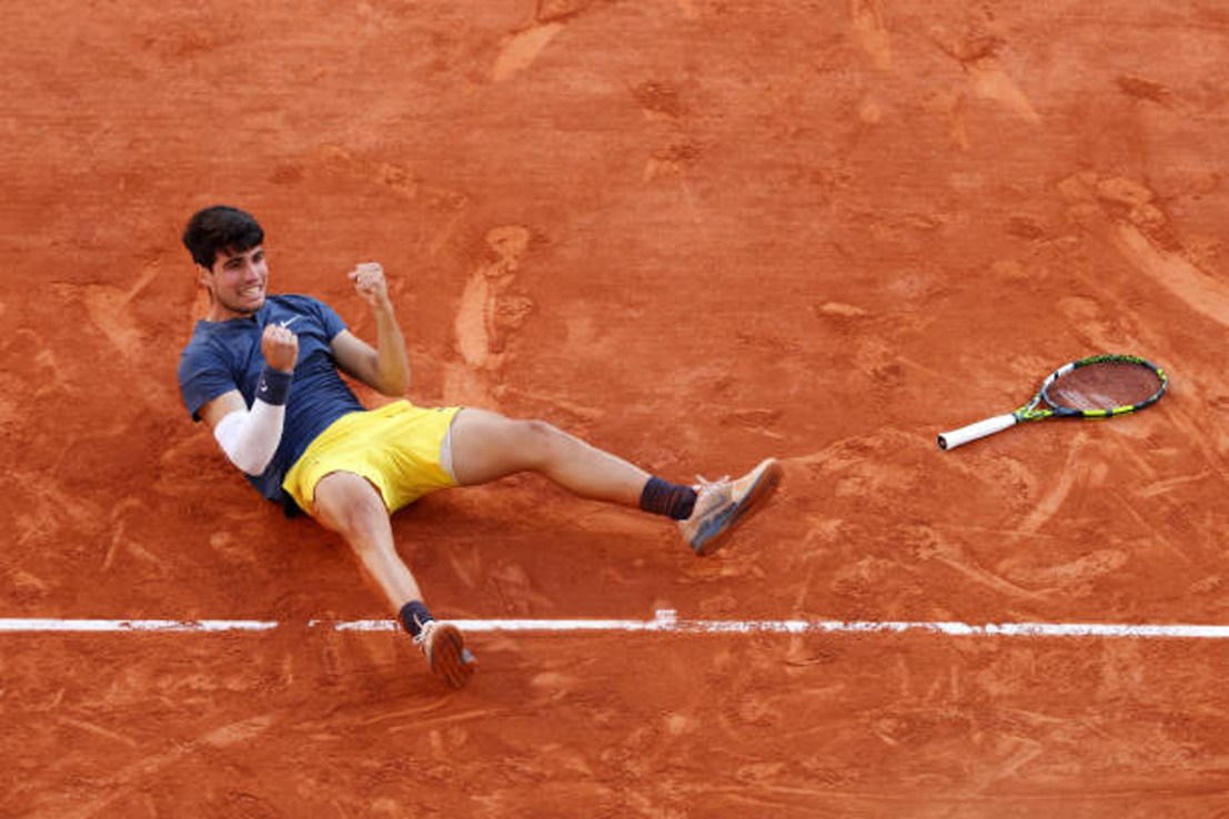 Carlos Alcaraz moved to within one title of a career Grand Slam on Sunday with a marathon five set victory over Alexander Zverev at the French Open.