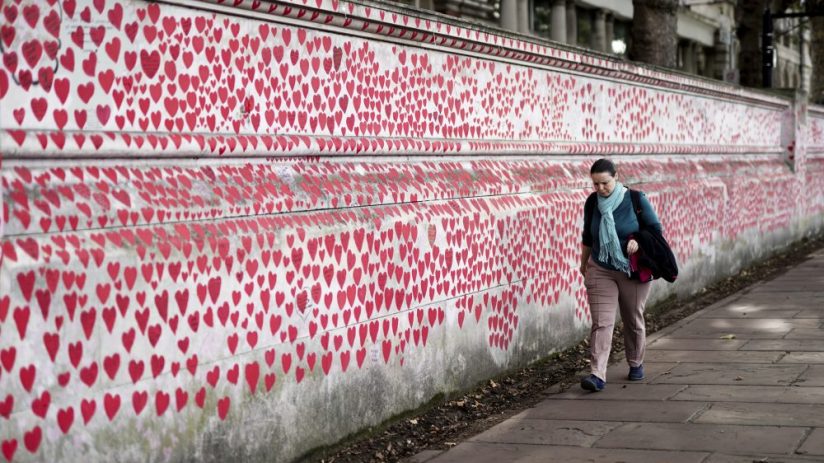 A member of the public observing the National Covid Memorial Wall, Photo credit: Jordan Pettitt/PA Wire