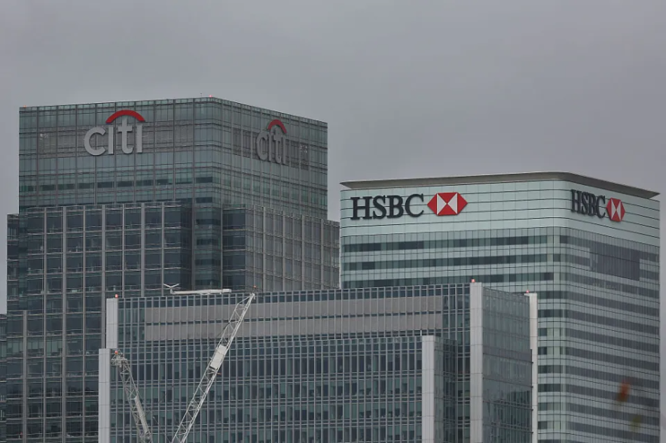 FTSE 100 lenders were in the red as markers opened.
