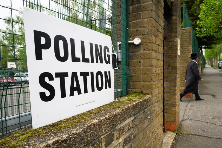 LONDON, ENGLAND - MAY 02: An Ultra-Orthodox Jewish man leaves a polling station after placing his vote in the London Mayoral election on May 02, 2024 in London, England. Polls have opened across 107 authorities in England where voters are set to determine the fate of nearly 2,700 council seats. (Photo by Leon Neal/Getty Images)