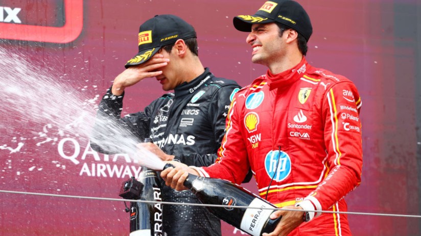 Third placed Carlos Sainz of Spain and Ferrari celebrates on the podium during the F1 Grand Prix of Austria at Red Bull Ring on June 30, 2024 in Spielberg, Austria. HP signed a major sponsorship deal with the team earlier this year. (Photo by Clive Rose/Getty Images)