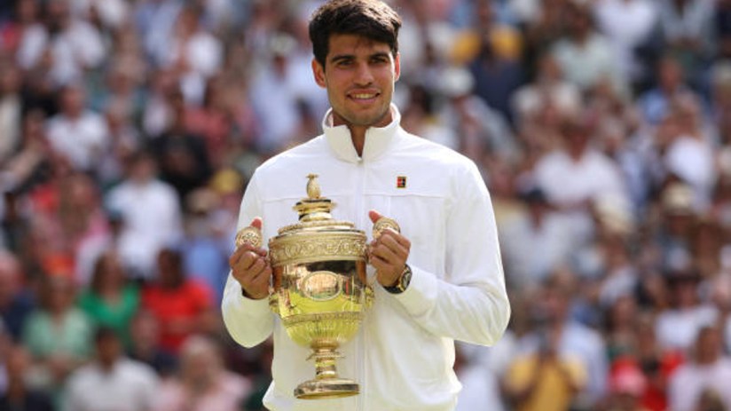 Carlos Alcaraz defended his Wimbledon title on Sunday and inflicted a worst ever SW19 defeat on Novak Djokovic at the All England Club.