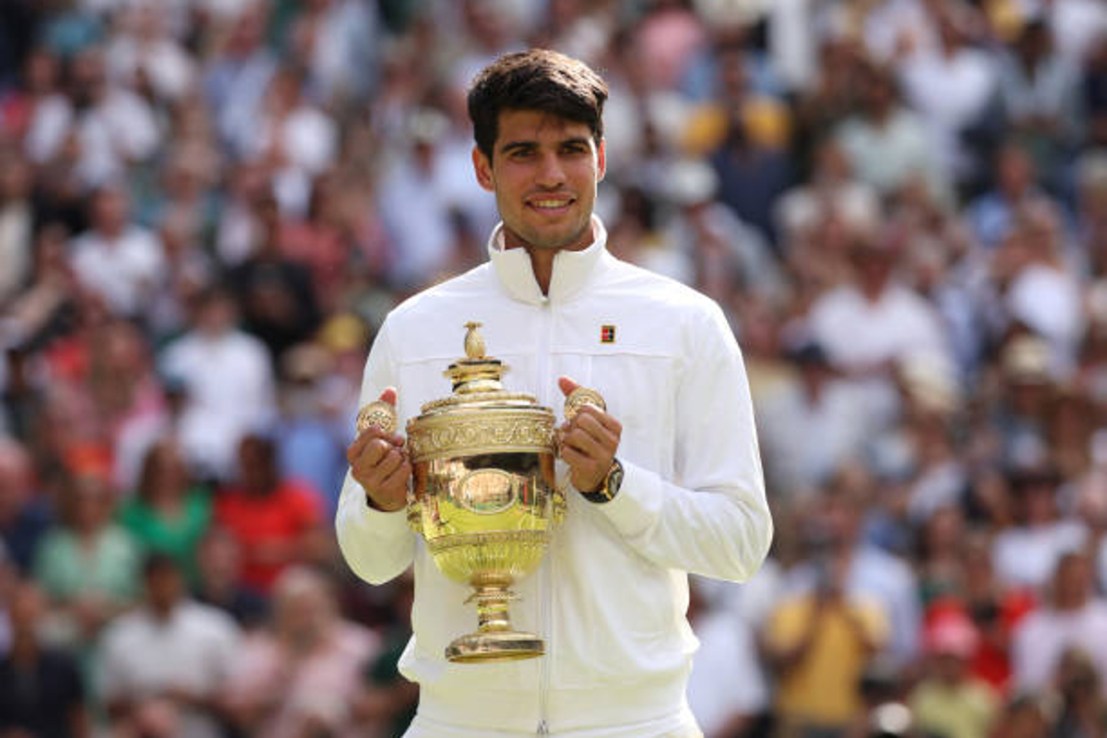 Carlos Alcaraz defended his Wimbledon title on Sunday and inflicted a worst ever SW19 defeat on Novak Djokovic at the All England Club.