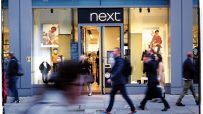 Next increased its full-year profit forecast by £14m