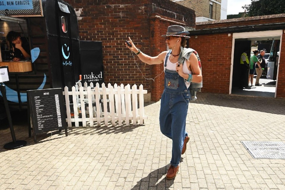 Tom Curran next to a pop-up coffee van selling his Naked Ground coffee