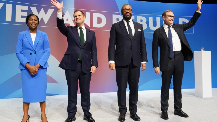 (left to right) Tory leadership candidates, Kemi Badenoch, Robert Jenrick , James Cleverly and Tom Tugendhat, stand together on stage after delivering their speeches during the Conservative Party Conference at the International Convention Centre in Birmingham. Stefan Rousseau/PA Wire