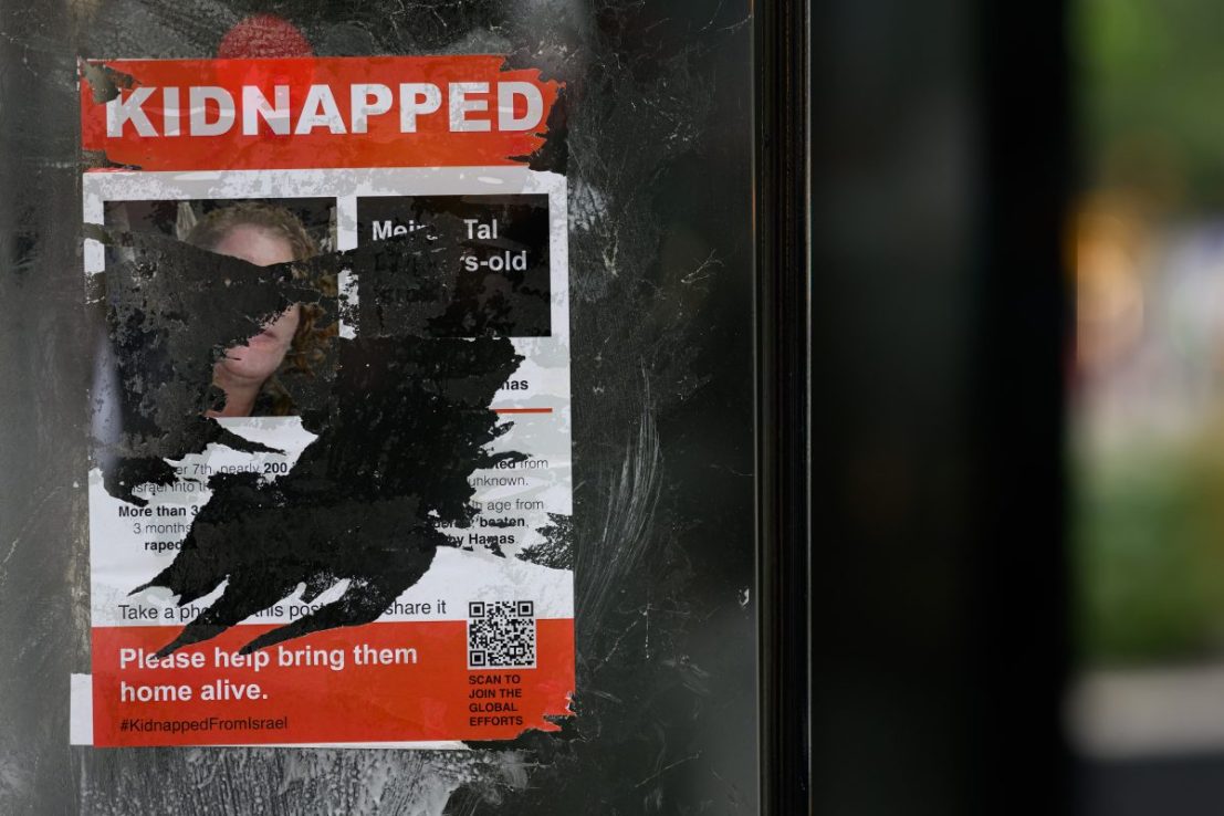 LONDON, UNITED KINGDOM - NOVEMBER 03: A defaced poster calling for the release of one of the Israeli hostages believed to be being held by Hamas is seen on a bus shelter on November 03, 2023 in London, England.  As the Israeli government vows to eliminate Hamas, whose Oct 7 attacks left an estimated 1,400 dead and 230 kidnapped, the fate of those hostages has complicated the country's military response. Families of the victims worry that the military offensive may result in hostages being killed during Israeli bombing or from Hamas's reprisals. Some families and friends of hostages, who remain in Gaza, are calling on the government to trade for Palestinian prisoners. (Photo by Leon Neal/Getty Images)