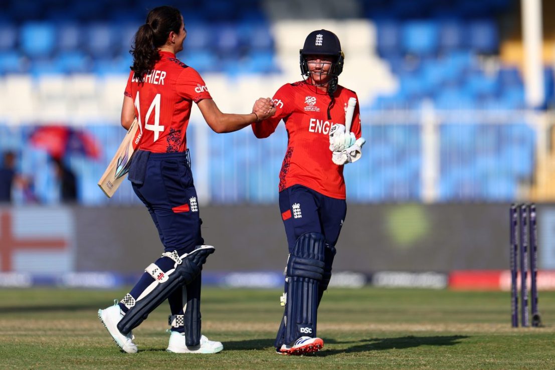 England thrashed Scotland in the Women's T20 Cricket World Cup to move top of their group and remain unbeaten.