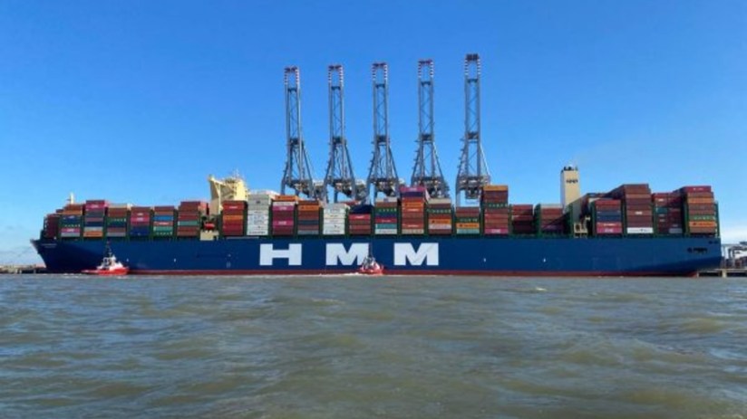 A giant container ship pulls into London Gateway.
