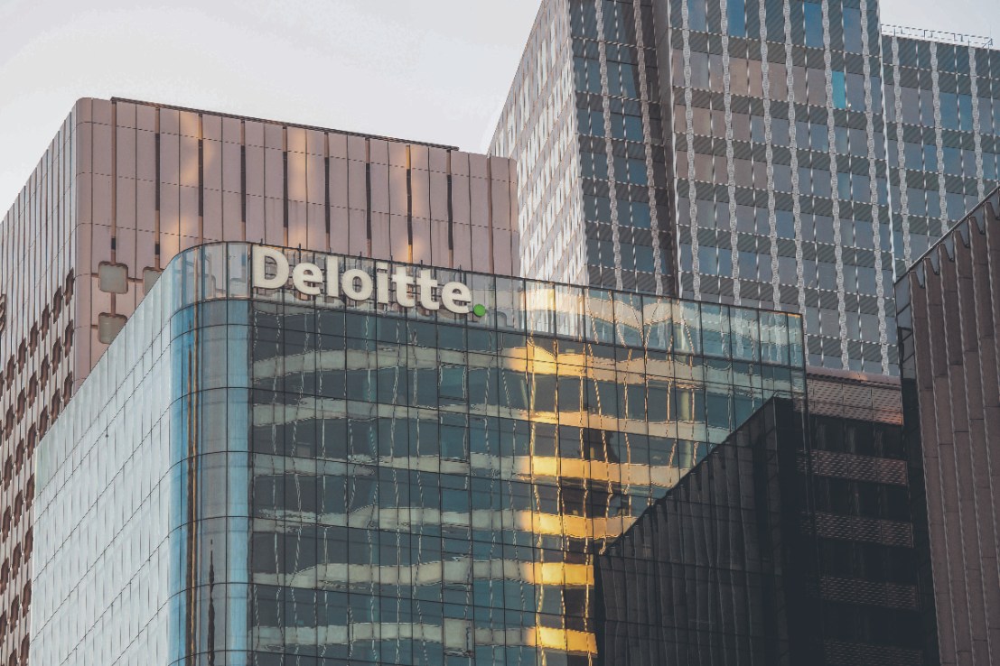 Deloitte is set to slash more jobs after getting rid of 250 last month. (Photographer: Benjamin Girette/Bloomberg via Getty Images)