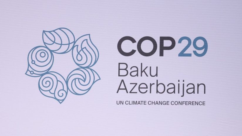 BERLIN, GERMANY - APRIL 25: The logo of the of the UNFCCC COP29 climate conference is seen at the Petersberg Climate Dialogue on April 25, 2024 in Berlin, Germany. The two-day event is a precursor to the UNFCCC COP29 climate conference that is scheduled to take place in November in Baku, Azerbaijan. (Photo by Sean Gallup/Getty Images)