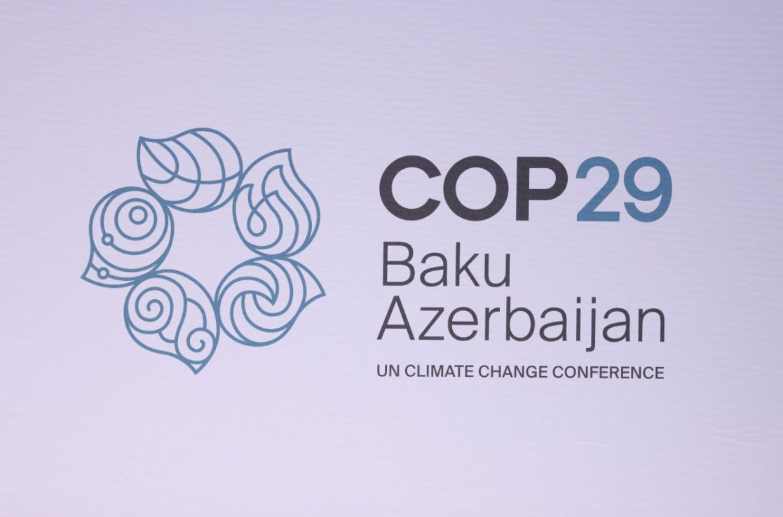 BERLIN, GERMANY - APRIL 25: The logo of the  of the UNFCCC COP29 climate conference is seen at the Petersberg Climate Dialogue on April 25, 2024 in Berlin, Germany. The two-day event is a precursor to the UNFCCC COP29 climate conference that is scheduled to take place in November in Baku, Azerbaijan. (Photo by Sean Gallup/Getty Images)