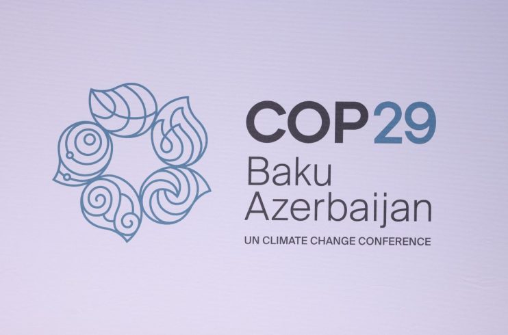 BERLIN, GERMANY - APRIL 25: The logo of the of the UNFCCC COP29 climate conference is seen at the Petersberg Climate Dialogue on April 25, 2024 in Berlin, Germany. The two-day event is a precursor to the UNFCCC COP29 climate conference that is scheduled to take place in November in Baku, Azerbaijan. (Photo by Sean Gallup/Getty Images)