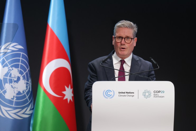 BAKU, AZERBAIJAN - NOVEMBER 12: British Prime Minister Keir Starmer delivers a national statement during the high level segment on day two of the UNFCCC COP29 Climate Conference at Baku Stadium on November 12, 2024 in Baku, Azerbaijan. The COP29, which is running from November 11 through 22, is bringing together stakeholders, including international heads of state and other leaders, scientists, environmentalists, indigenous peoples representatives, activists and others to discuss and agree on the implementation of global measures towards mitigating the effects of climate change. According to the United Nations, countries made no progress over the last year in reducing global emissions from the burning of fossil fuels. (Photo by Sean Gallup/Getty Images)