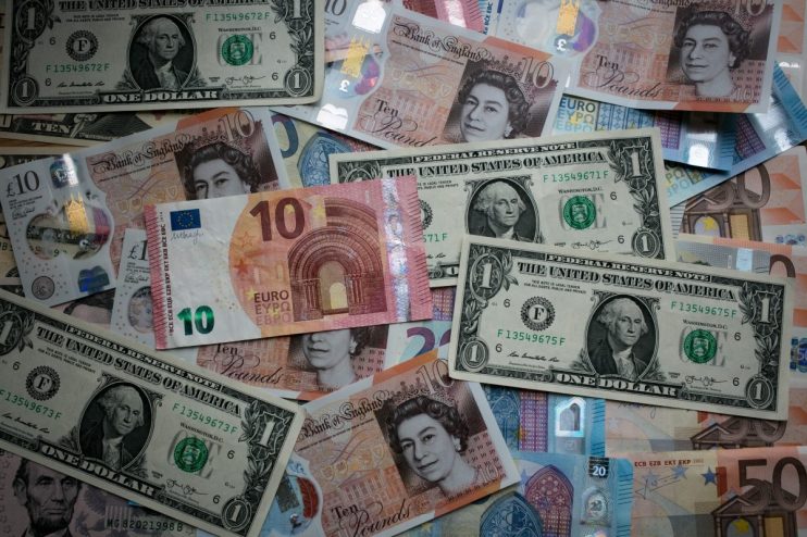 BATH, ENGLAND - OCTOBER 13: In this photo illustration, the new £10 note is seen alongside euro notes and US dollar bills on October 13, 2017 in Bath, England. Currency experts have warned that as the uncertainty surrounding Brexit continues, the value of the British pound, which has remained depressed against the US dollar and the euro since the UK voted to leave in the EU referendum, is likely to fluctuate. (Photo Illustration by Matt Cardy/Getty Images)