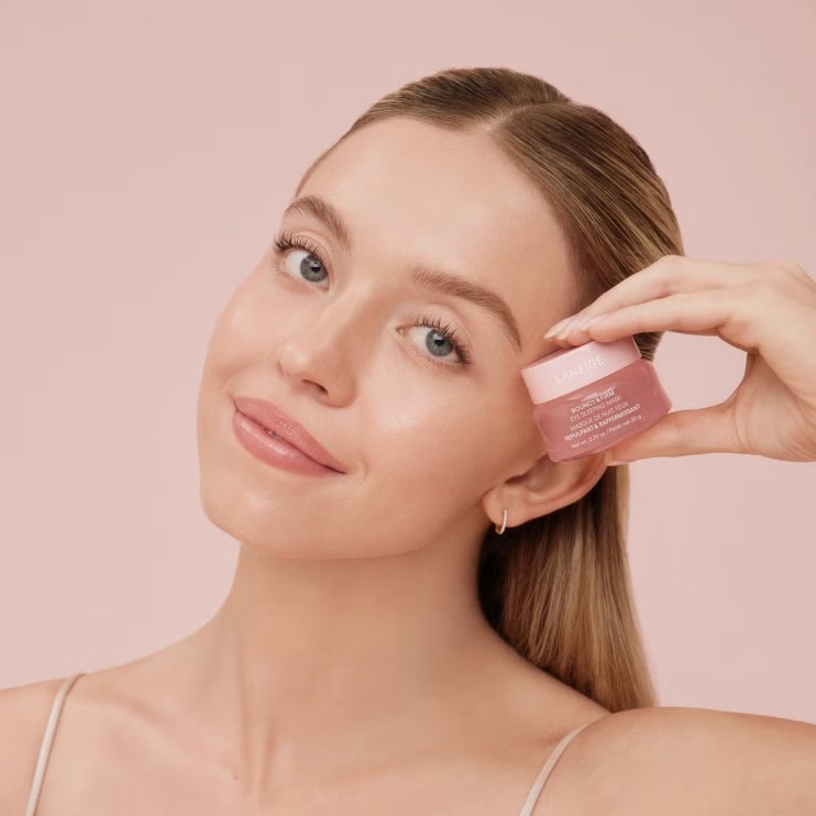 Cult Beauty Masks - Model holding a Skin Mask from Cult Beauty
