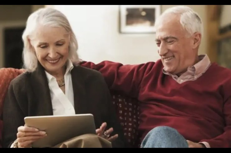 Older couple using a tablet