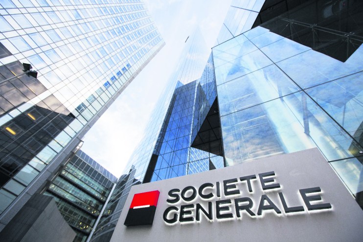 The Societe Generale SA logo sits on a sign outside the bank's headquarters in La Defense business district in Paris, France (Photographer: Jason Alden/Bloomberg via Getty Images)