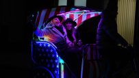 LONDON, UNITED KINGDOM - DECEMBER 06: Two women sing aloud to the onboard stereo system as they're transported through Westminster on a pedicab on December 06, 2023 in London, United Kingdom. (Photo by Leon Neal/Getty Images)