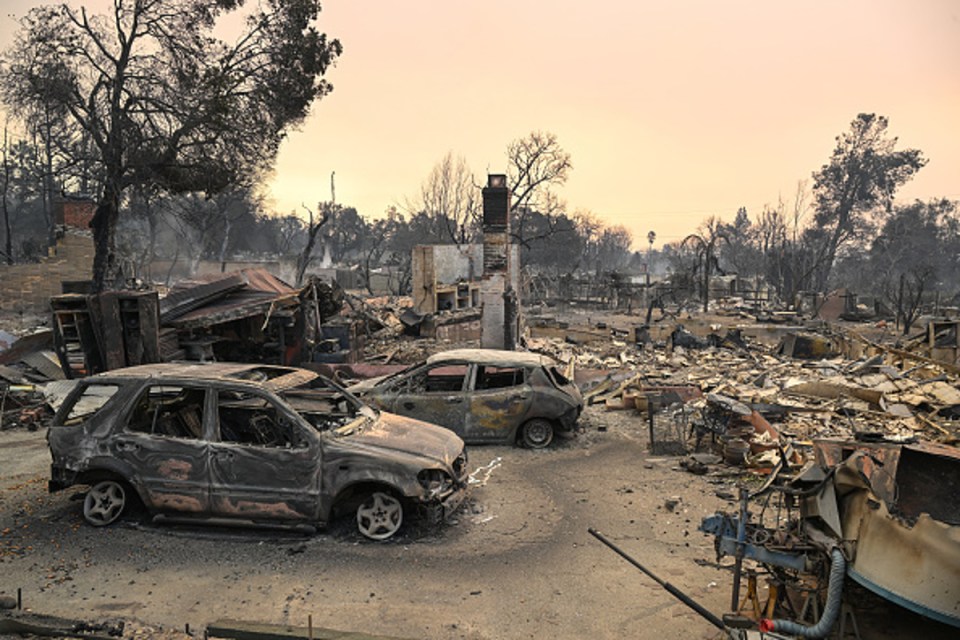 A view of burnt houses and vehicles during Eaton wildfire in Altadena of Los Angeles County, California, United States on January 9, 2025. (Photo by Tayfun Coskun/Anadolu via Getty Images)
