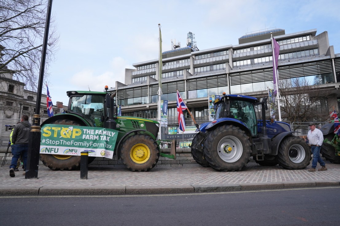 Members of the National Farming Union's (NFU) Stop the Family Farm Tax campaign park tractors outside QEII Centre in London, where NFU annual conference took place, to protest over the changes to inheritance tax (IHT) rules in the budget. Picture date: Tuesday February 25, 2025. (Photograph: Lucy North/PA Wire)