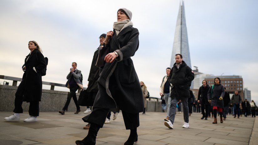 LONDON, UNITED KINGDOM - JANUARY 31: The Shard is seen on the horizon as commuters cross London Bridge during the morning rush hour on January 31, 2023 in London, United Kingdom. The IMF reports that the UK economy will contract by 0.6% in 2023, as opposed to the previous prediction it might grow, and will perform worse than many other advanced economies, including Russia.The cost of living continues to hit households with grocery inflation for the first four weeks of 2023 rising to 16.7% which would add a further £788 per year to family food bills. (Photo by Leon Neal/Getty Images)