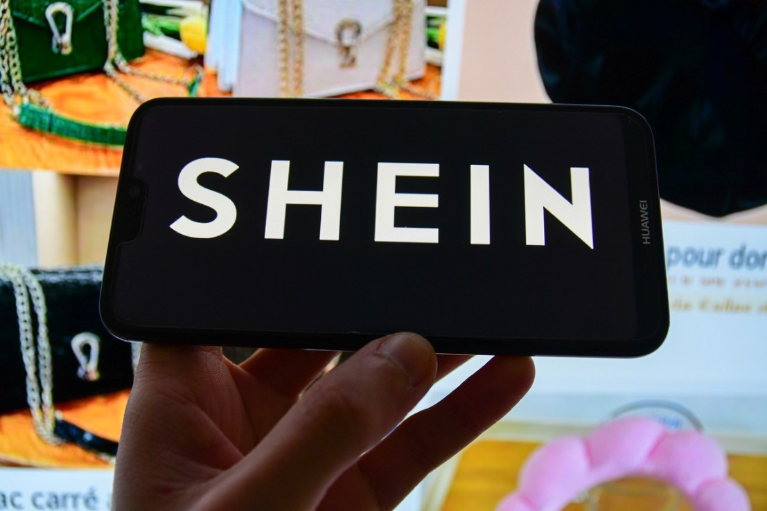 A photo illustration of the Shein company logo, a Chinese-founded online fashion retailer for adults and children (Photo Illustration by Romain Doucelin/SOPA Images/LightRocket via Getty Images)