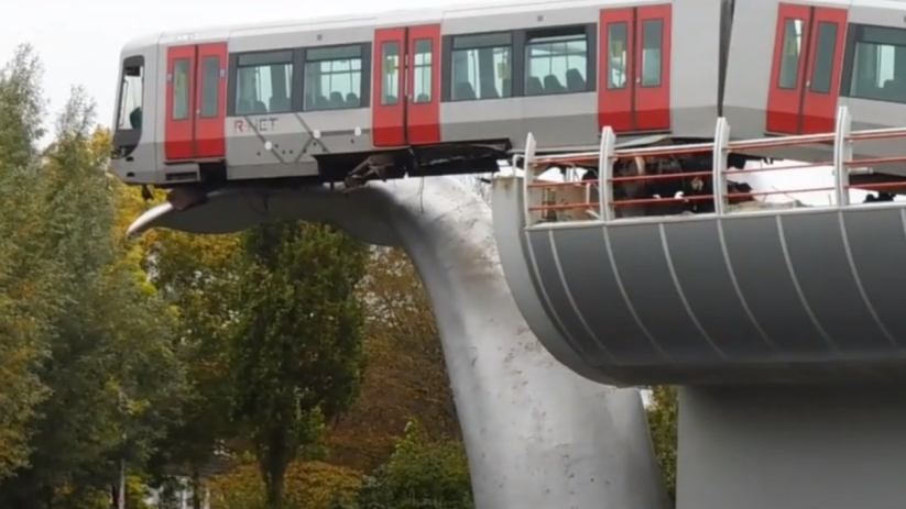 The power of art, symbolised by a Rotterdam metro saved by a whale's tail (Kim Naomi/Wikimedia Commons)