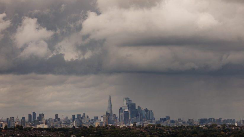 LONDON, UNITED KINGDOM - SEPTEMBER 23: Heavy rain clouds pass over the city of London skyline on September 23, 2024 in London, United Kingdom. The Met Office has issued amber weather warnings for heavy rain in the Oxford region with yellow warnings stretching from Middlesbrough to the South Coast. (Photo by Dan Kitwood/Getty Images)